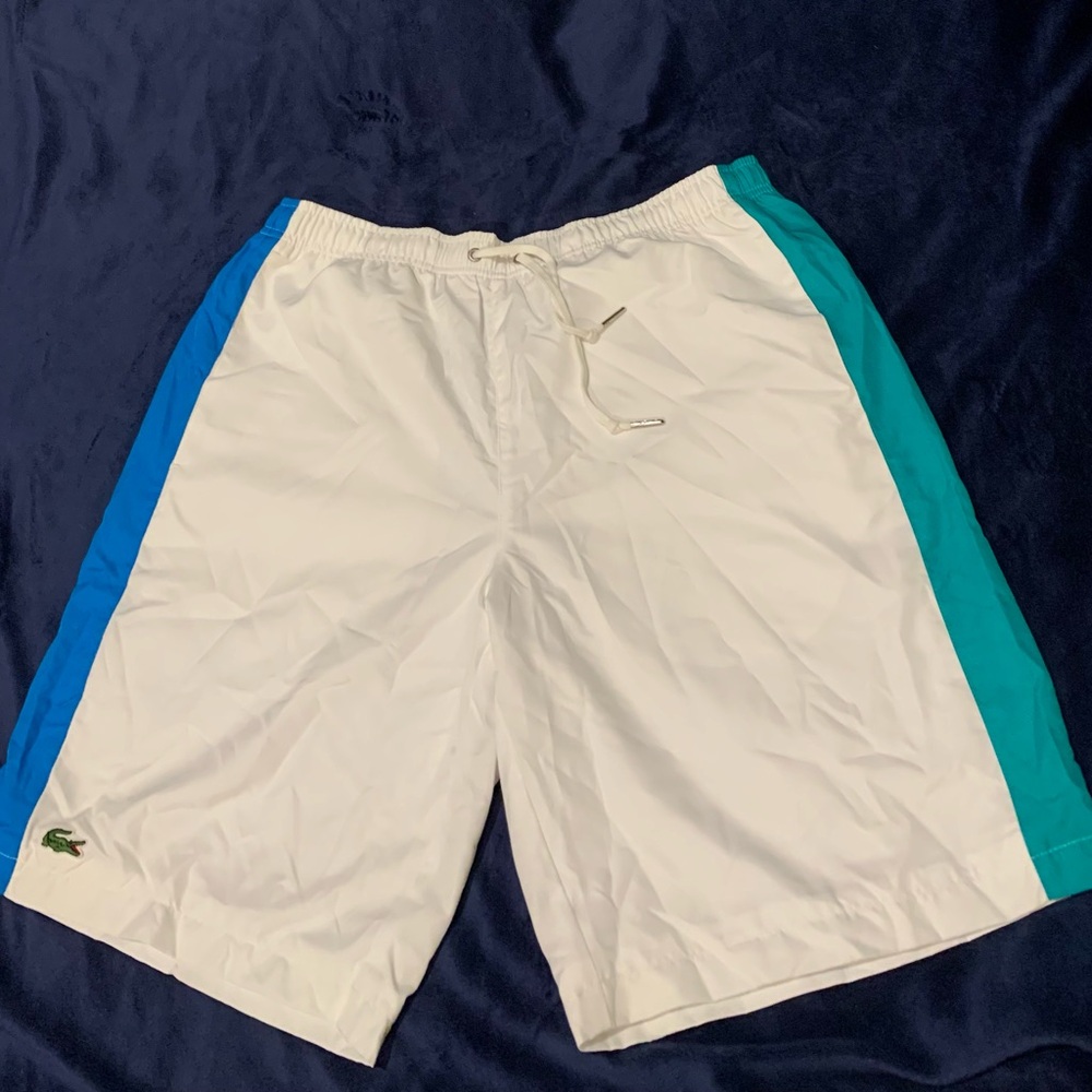 Lacoste White and Blue Swim Shorts
Size 4 men’s